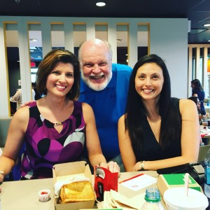 Tough duty being a food critic. This was snapped with KEYE weathercaster Chikage Windler and her sister at the introduction of the first McDonald's sandwich ever designed by a customer.